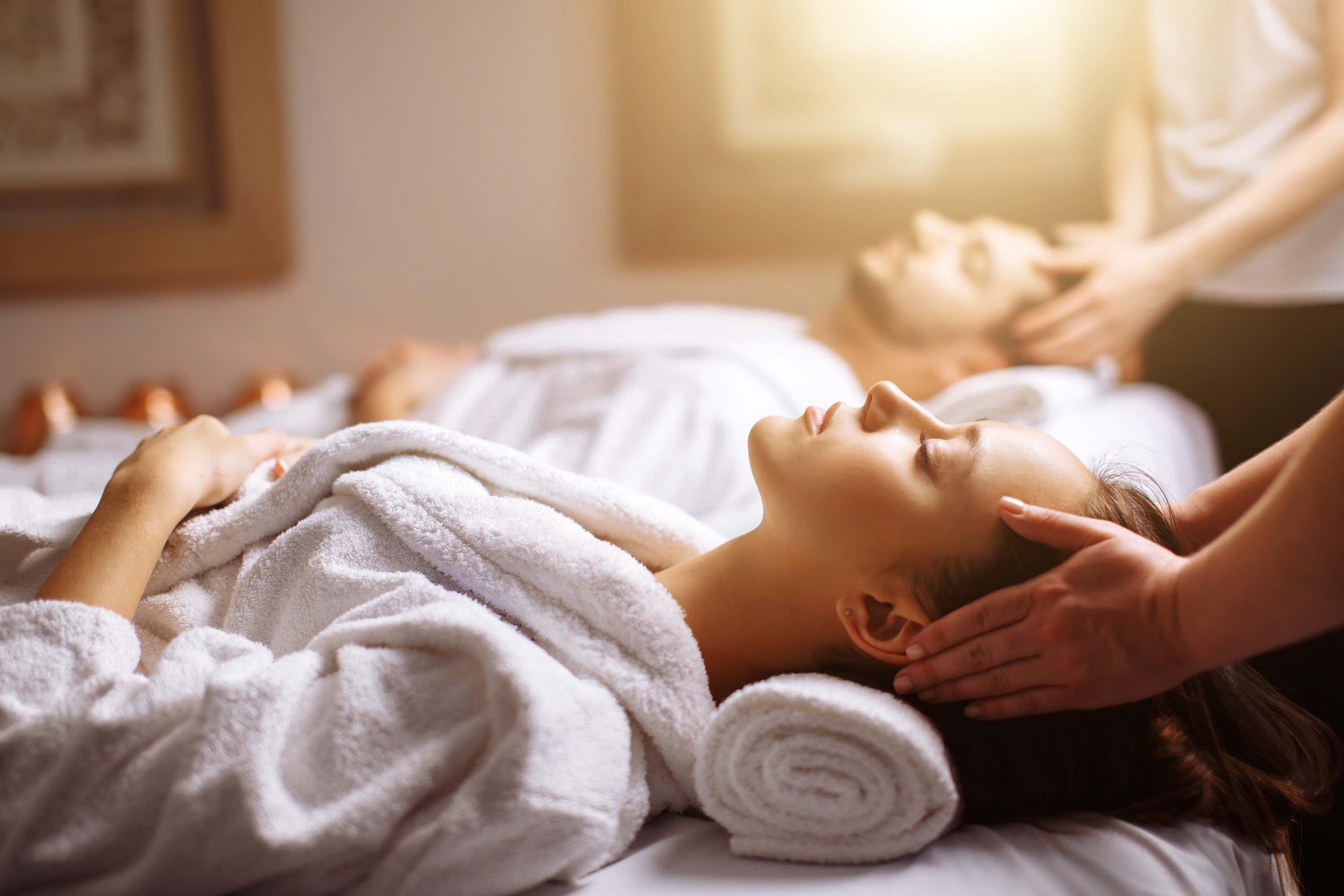 Lady getting a scalp massage